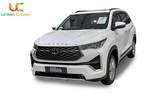 a white coloured 7 seater kia carnival on rent in mumbai