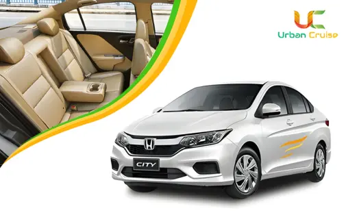 A white coloured 4 seater toyota etios on rent in delhi