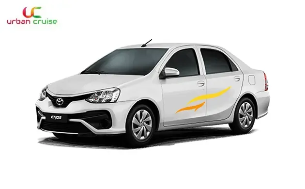 A white coloured 4 seater toyota etios on rent in mumbai